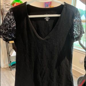 Short sleeved Torrid brand black top with lace sleeves